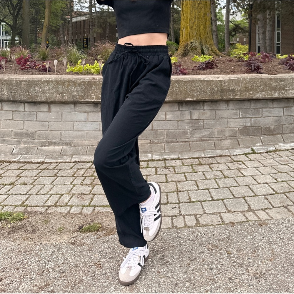 Brand new black long pants with pocket and ajustable waistband